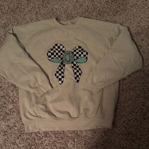 Sand color with checkered and turquoise bow